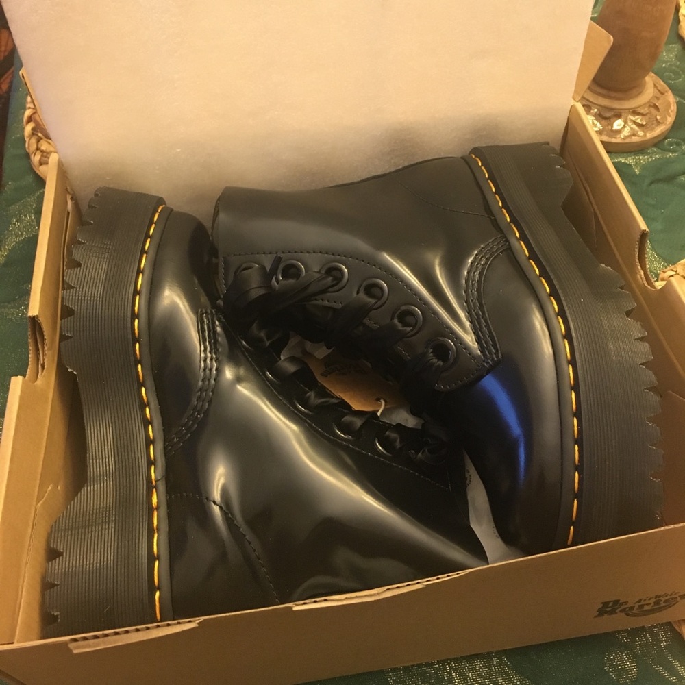 Dr Martins.. brand new; never worn. Too big for me. Still in the original box.